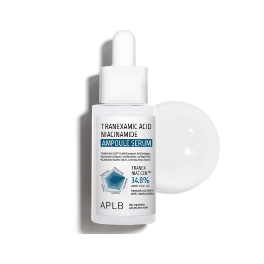 APLB Tranexamic Acid Niacinamide Ampoule Serum is a targeted formula crafted to brighten and even out skin tone. It features a potent combination of Tranexamic Acid and Niacinamide, both known for their powerful skin-brightening and anti-inflammatory properties. With 34.6% Centella Asiatica Leaf Water, this serum also calms and soothes the skin. Additional ingredients like Eggplant and Tea Tree Extracts aid in refining skin texture and reducing blemishes. Ideal for those looking to diminish dark spots and e