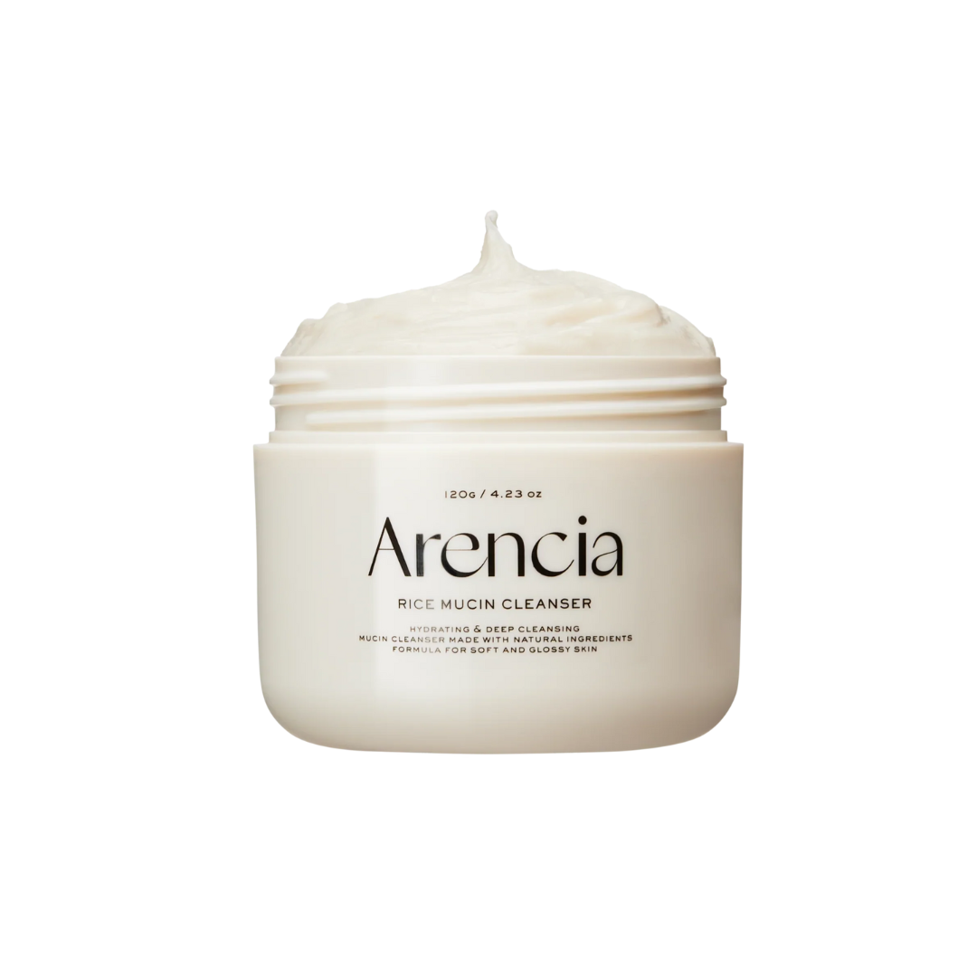 ARENCIA Rice Mucin Cleanser is a gentle, creamy cleanser that purifies and softens skin while preserving moisture. Formulated with Rice Powder and Snail Secretion Filtrate, it lightly exfoliates, hydrates, and supports skin repair. The rich foam effectively removes impurities without stripping the skin, leaving it smooth and nourished. Perfect for daily use.