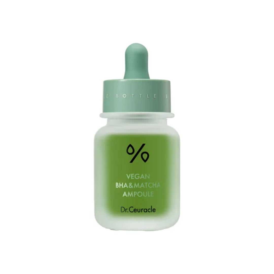 DR. CEURACLE Vegan BHA & Matcha Ampoule is a clarifying and soothing serum formulated to target pores and improve skin texture. Infused with Salicylic Acid (BHA) and Matcha (Camellia Sinensis Leaf Extract), this ampoule gently exfoliates dead skin cells, unclogs pores, and controls excess oil, leaving the skin smoother and more refined. The addition of peptides helps to boost skin's elasticity and promote a youthful, radiant complexion. Ideal for those with oily, acne-prone, or combination skin looking