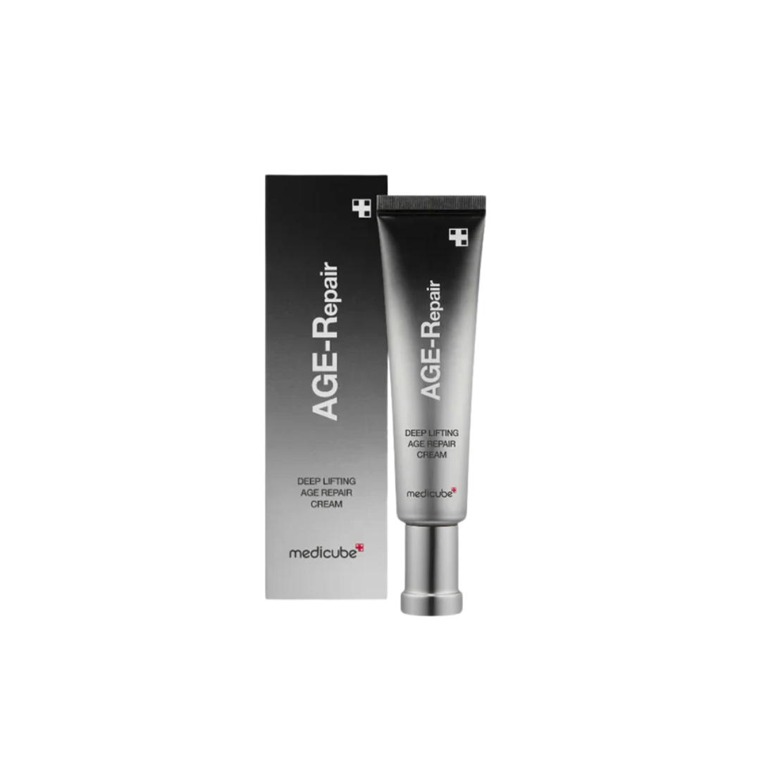 MEDICUBE Deep Lifting Age Repair Cream is a rich, rejuvenating formula designed to target signs of aging and restore skin firmness. Infused with Niacinamide, Squalane, Shea Butter, and Meadowfoam Seed Oil, it deeply nourishes and strengthens the skin barrier. A powerful blend of Peptides, Collagen, and multiple forms of Hyaluronic Acid works to smooth fine lines, improve elasticity, and boost hydration. Best for dry, mature, and aging skin types, this cream leaves skin looking lifted, plump, and radiant.