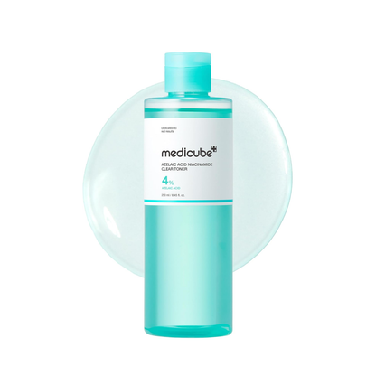MEDICUBE Azelaic Acid Niacinamide Clear Toner is a gentle, balancing toner designed to help control excess oil while keeping skin calm and hydrated. Formulated with Azelaic Acid, it supports clearer-looking skin and helps improve the appearance of uneven skin tone. Niacinamide works to refine and balance the complexion, while ingredients like Hyaluronic Acid, Aloe Vera Leaf Extract, and Centella Asiatica provide soothing hydration. The lightweight, non-comedogenic formula refreshes the skin without clogging