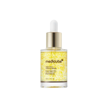 MEDICUBE Deep Vita C Capsule Serum is a brightening serum designed to revive dull-looking skin and enhance radiance. Formulated with 99% high-purity Vitamin C, 5% Niacinamide, 77% Hippophae Rhamnoides Water, Glutathione, Panthenol, Sodium Hyaluronate, and multiple forms of Vitamin C, it helps improve the look of uneven skin tone, boost glow, and keep skin hydrated. The Vitamin C liposome capsules melt quickly into the skin for lightweight, refreshing care. Suitable for dull, uneven, normal, combination, oil