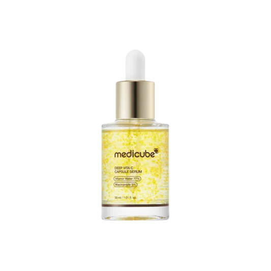 MEDICUBE Deep Vita C Capsule Serum is a brightening serum designed to revive dull-looking skin and enhance radiance. Formulated with 99% high-purity Vitamin C, 5% Niacinamide, 77% Hippophae Rhamnoides Water, Glutathione, Panthenol, Sodium Hyaluronate, and multiple forms of Vitamin C, it helps improve the look of uneven skin tone, boost glow, and keep skin hydrated. The Vitamin C liposome capsules melt quickly into the skin for lightweight, refreshing care. Suitable for dull, uneven, normal, combination, oil