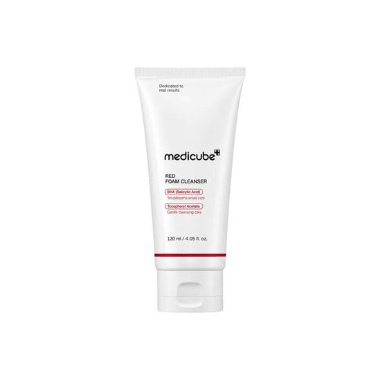 MEDICUBE Red Foam Cleanser is a deep-cleansing facial wash designed for oily, acne-prone, and troubled skin. Formulated with 0.5% Salicylic Acid, it helps remove excess sebum, unclog pores, and gently clear away dead skin cells for a smoother, clearer complexion. The rich foam effectively washes away impurities and makeup residue while Sophora Angustifolia Root Extract helps care for irritated skin. Ideal for combination, oily, and acne-prone skin.