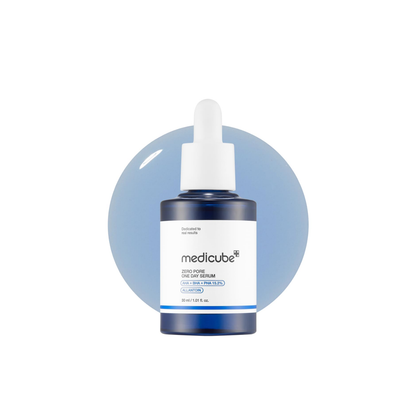 MEDICUBE Zero Pore One Day Serum is a concentrated exfoliating serum designed to help visibly tighten the look of enlarged pores. Formulated with 15.2% AHA, BHA, and PHA, it targets pore congestion and uneven texture while smoothing the skin’s surface for a refined, dewy finish. The formula helps balance oil and moisture levels, supporting healthier-looking skin with improved smoothness and clarity.