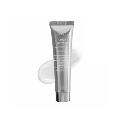 S. NATURE Aqua Squalane Moisturizing Cream is a deeply hydrating formula designed to replenish and protect dry or sensitive skin. Enriched with Squalane, Panthenol, and Hyaluronic Acid Complex, it delivers lasting moisture while strengthening the skin barrier. With added Hydrolyzed Collagen and Acetyl Hexapeptide-8, it also helps improve elasticity and smooth the appearance of fine lines. Ideal for dehydrated, rough, or tired skin in need of a moisture boost.