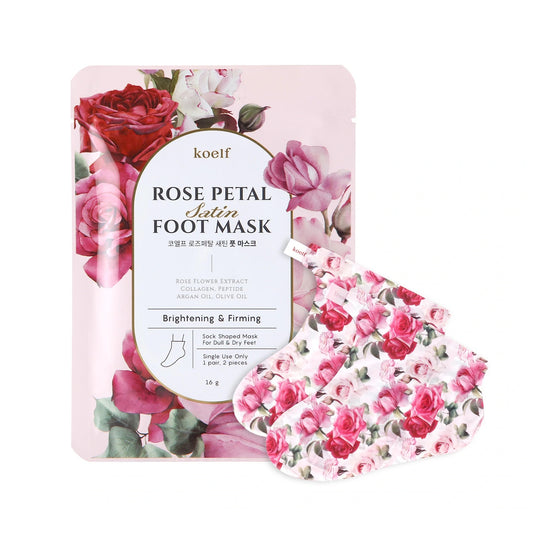KOELF Rose Petal Satin Foot Mask is a hydrating and smoothing treatment that pampers tired, dry feet. Enriched with Rose Extract, Shea Butter, and Niacinamide, it deeply nourishes and helps improve skin tone and texture. Urea and Salicylic Acid gently soften rough areas, while Hyaluronic Acid and Ceramide NP lock in moisture to keep skin supple. A blend of Olive, Argan, and Macadamia Oils adds extra nourishment, while Peptides and Amino Acids support skin renewal. Infused with a delicate rose scent, this fo