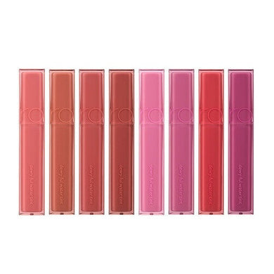 ROMAND Dewyful Water Tint is a hydrating lip tint that delivers a glossy, dewy finish with long-lasting color. Formulated with moisturizing ingredients like Glycerin and Squalane, it keeps lips soft and supple while providing a vibrant, sheer wash of color. The lightweight, water-based formula glides on smoothly, leaving lips looking plump and radiant without feeling sticky. Perfect for achieving a fresh and glossy lip look that lasts all day. 