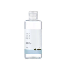 Load image into Gallery viewer, ROUND LAB 1025 Dokdo Toner is a gentle and hydrating toner that helps to balance and refresh the skin. Enriched with Sea Water, Chondrus Crispus (Carrageenan) Extract, and Saccharum Officinarum Ferment Extract, this toner deeply nourishes while promoting a smooth, clear complexion. Ingredients like Panthenol and Allantoin provide soothing hydration, making it ideal for all skin types, especially those looking to maintain moisture and calm irritation. The lightweight formula absorbs quickly, leaving your ski