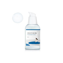 Load image into Gallery viewer, ROUND LAB Birch Juice Moisturizing Serum is formulated with Birch Sap and enriched with Sodium Hyaluronate and Hydrolyzed Hyaluronic Acid to deliver deep hydration and maintain moisture balance. The serum includes Vitamin C (Ascorbic Acid) to brighten the complexion, while a blend of botanical extracts such as Artichoke Leaf and Oat Kernel helps to soothe and protect the skin. Ideal for those seeking a nourishing and revitalizing serum to enhance skin hydration and radiance.